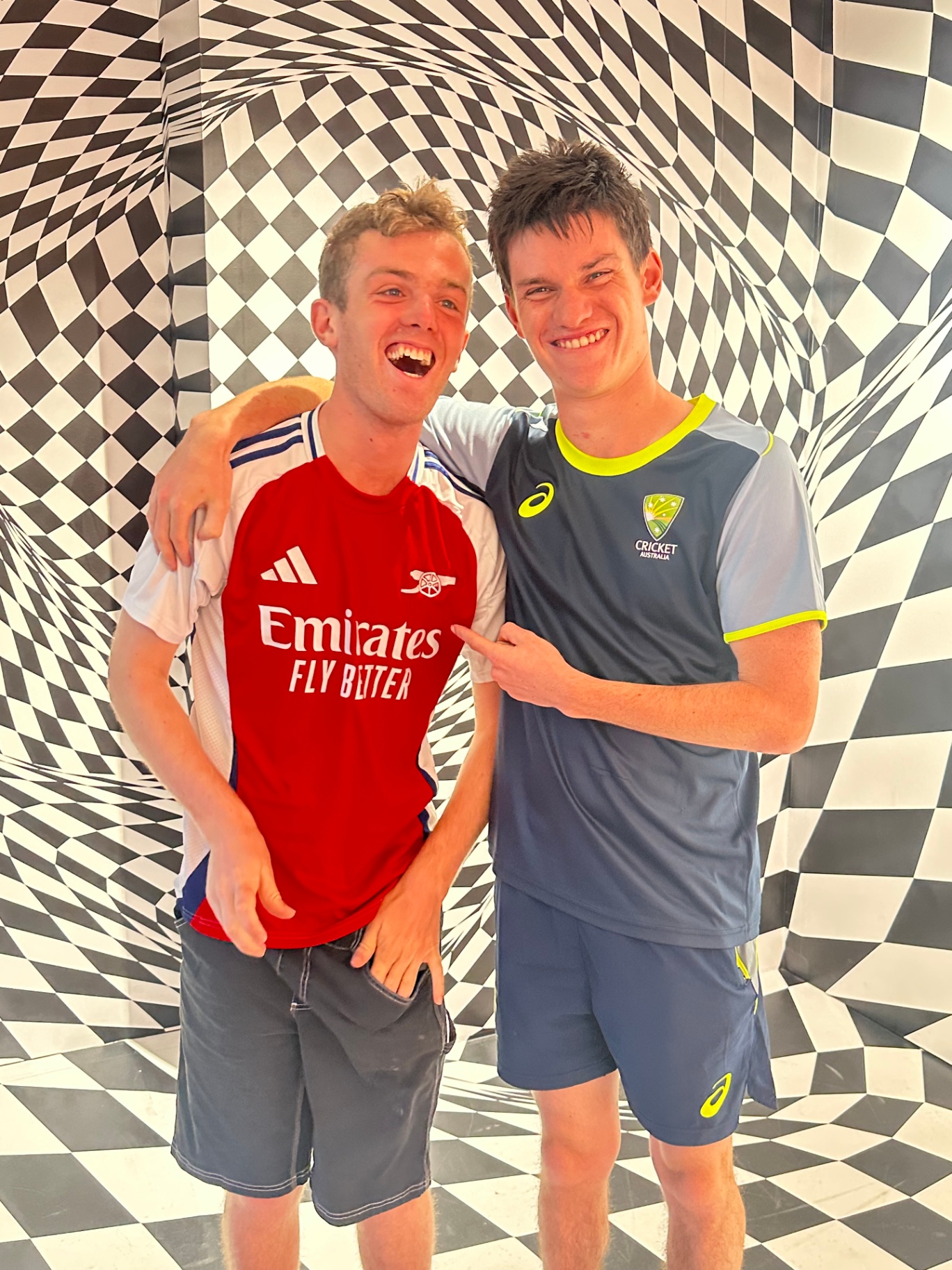 With George mates in their favourite team jerseys